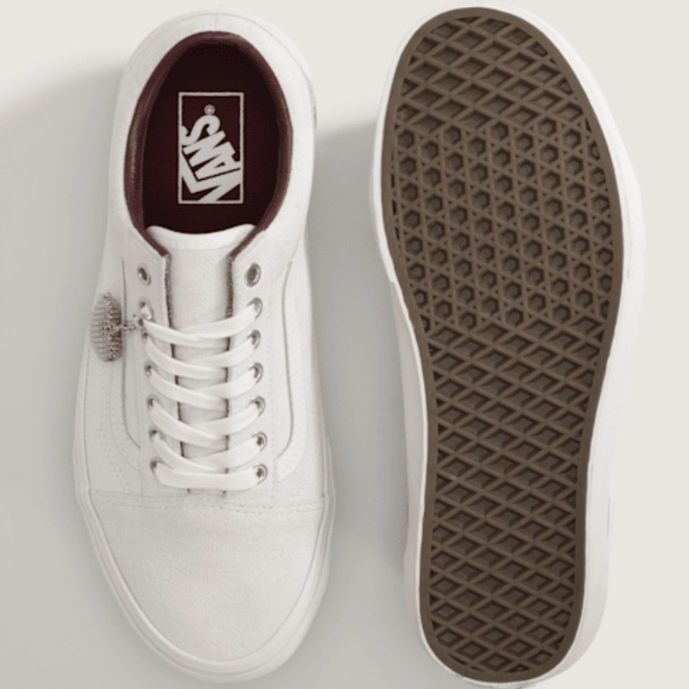 Vans Womens “Love is Pain”  Old Skool 
Blanc De Blanc White with heart charm.